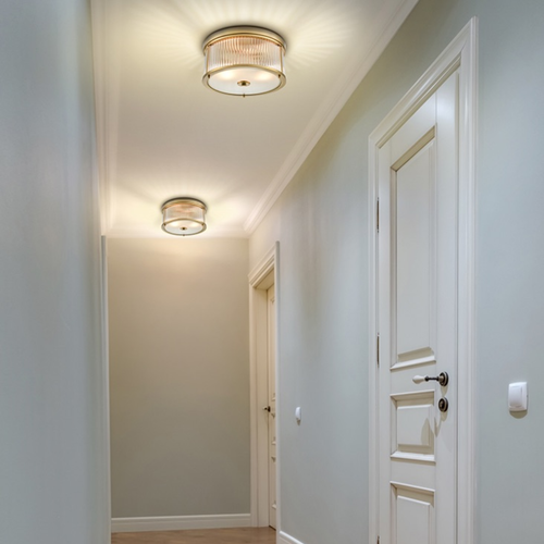 Aged brass flush ceiling light with ribbed glass shade