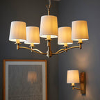 Ortona Matt Antique Brass Wall Light with Vintage White Faux Silk Shade
