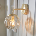 Dimple 1-Light Champagne Glass Wall Light with Brushed Gold Finish