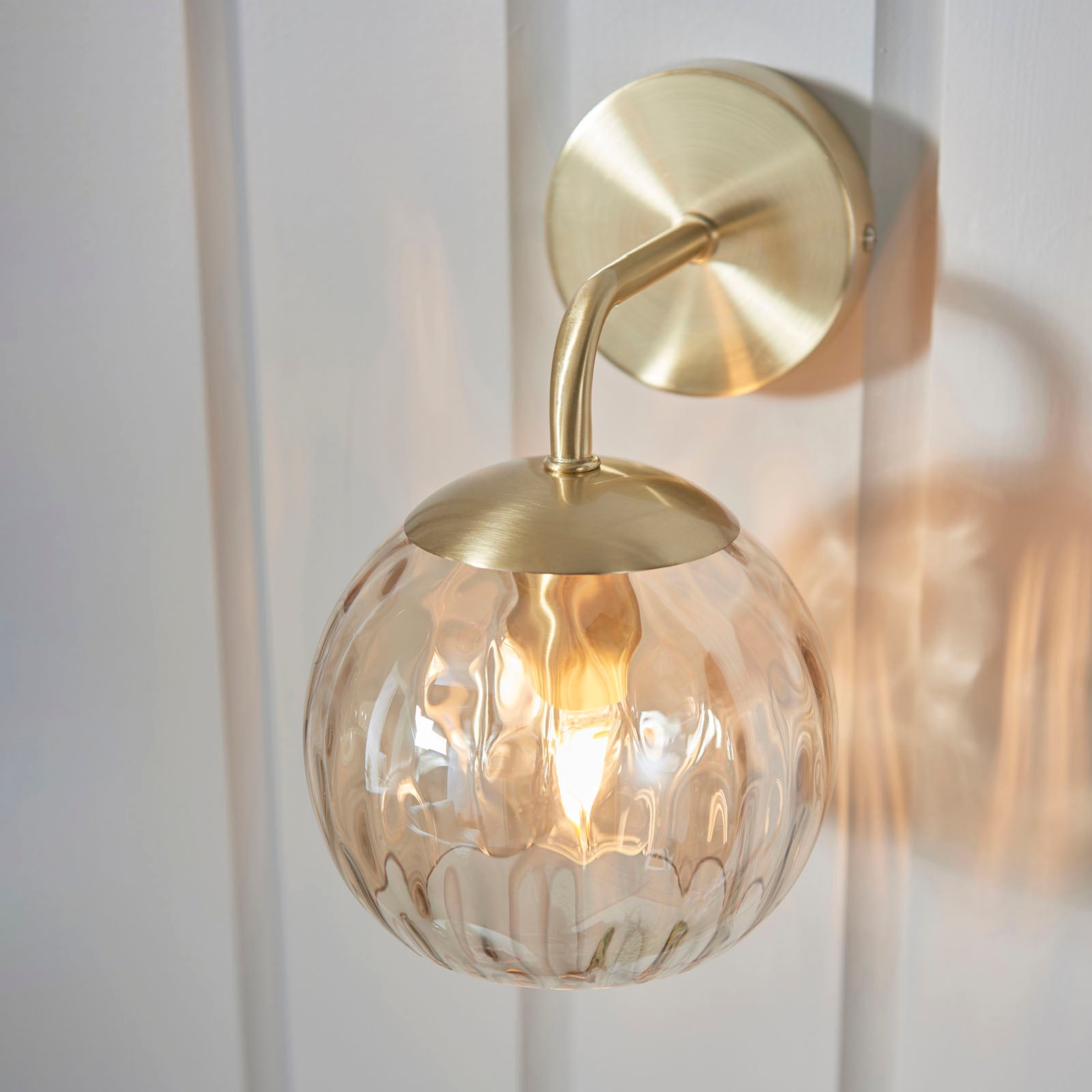 Dimple 1-Light Champagne Glass Wall Light with Brushed Gold Finish
