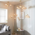 Dimple 3-Light Champagne Glass Floor Lamp with Brushed Gold Finish