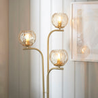 Dimple 3-Light Champagne Glass Floor Lamp with Brushed Gold Finish