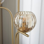 Dimple 3-Light Champagne Glass Floor Lamp with Brushed Gold Finish
