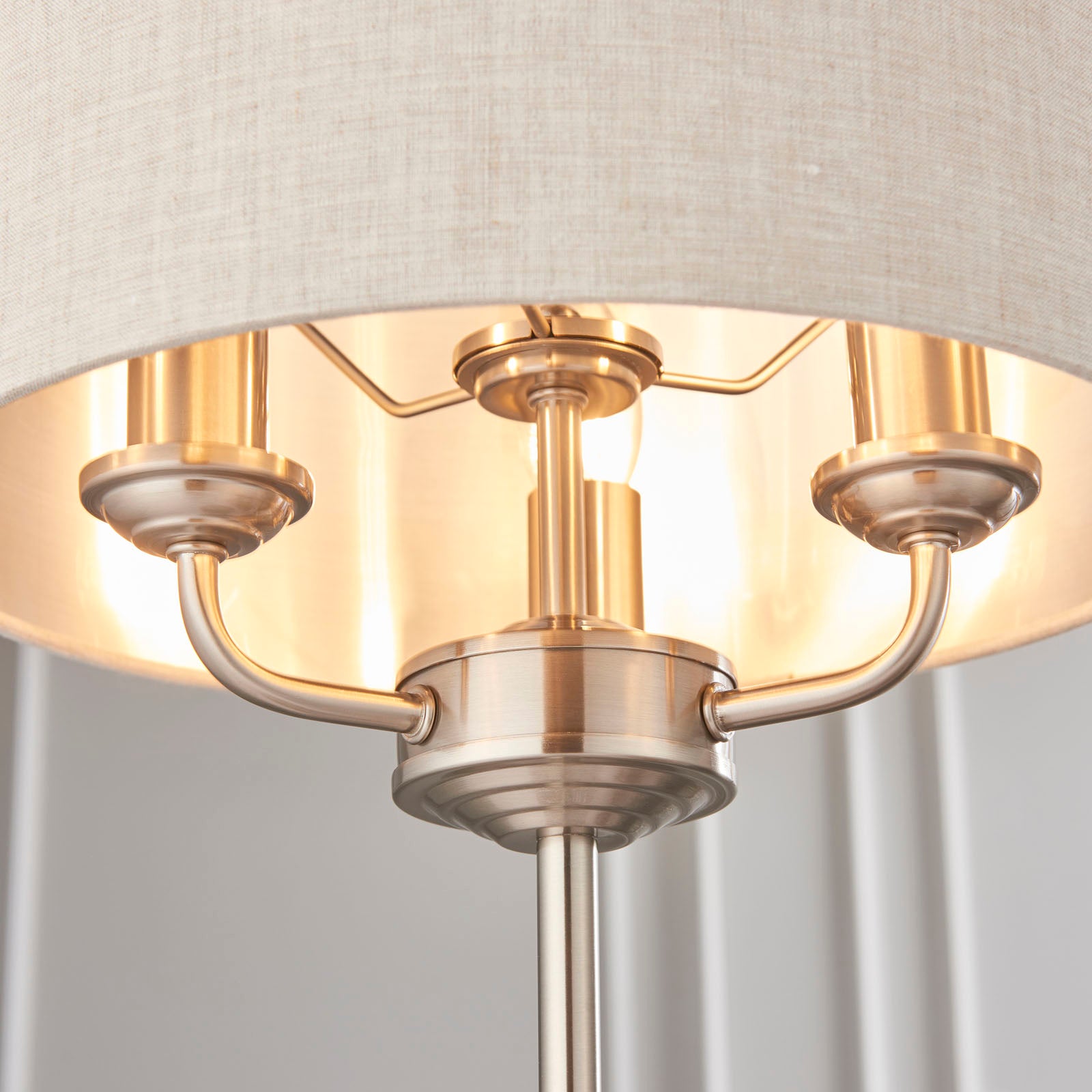 Highclere Brushed Chrome 3-Light Table Lamp with Natural Linen Shade