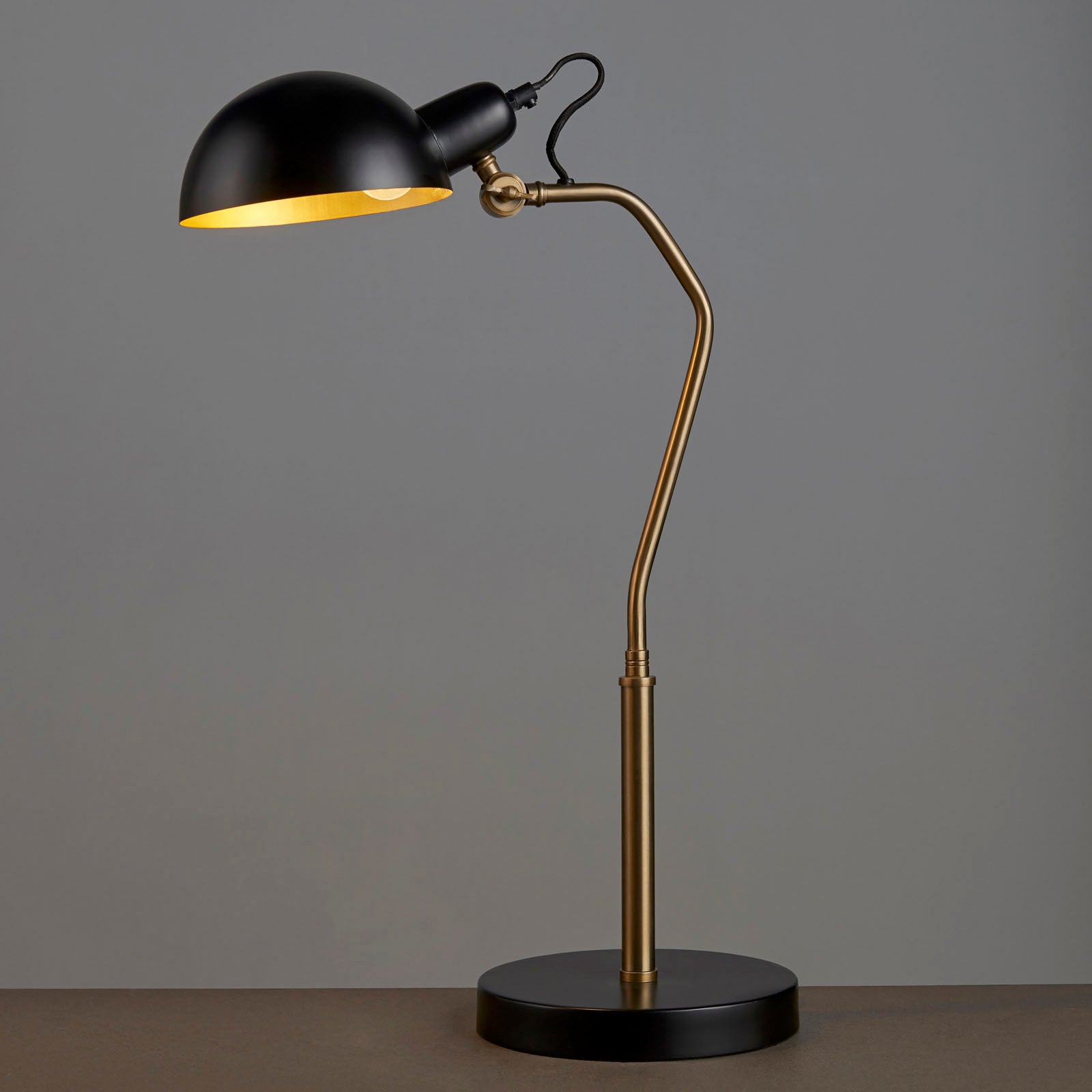 Largo 1-Light Table Lamp in Aged Brass and Black with Adjustable Head