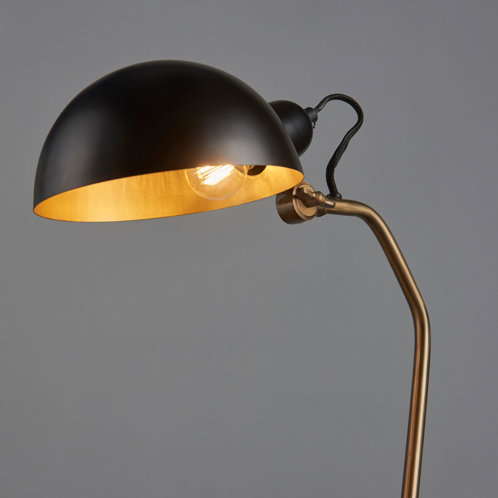 Largo 1-Light Table Lamp in Aged Brass and Black with Adjustable Head