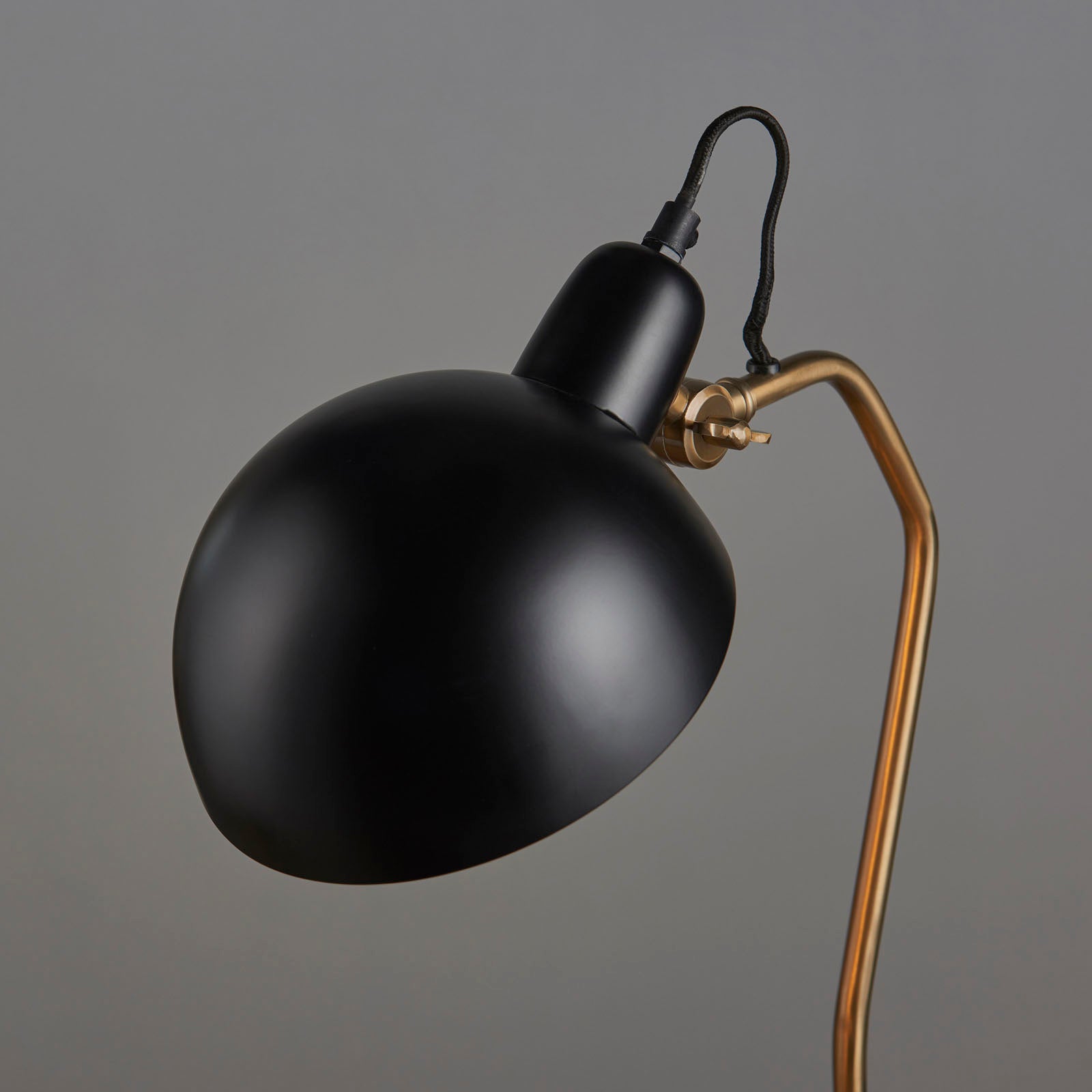 Largo 1-Light Table Lamp in Aged Brass and Black with Adjustable Head
