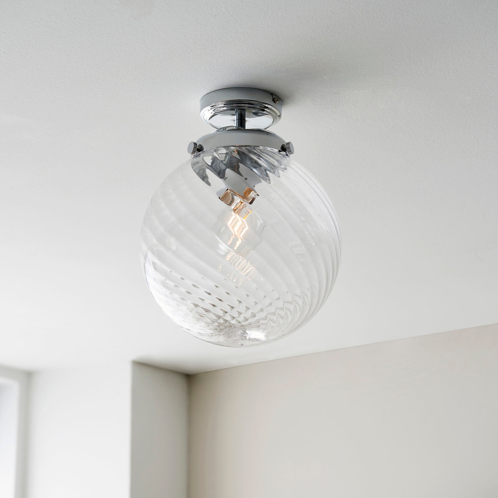 Milston 1-Light Dimmable Wall Light with Clear Spiral Glass Shade (IP44 Rated)