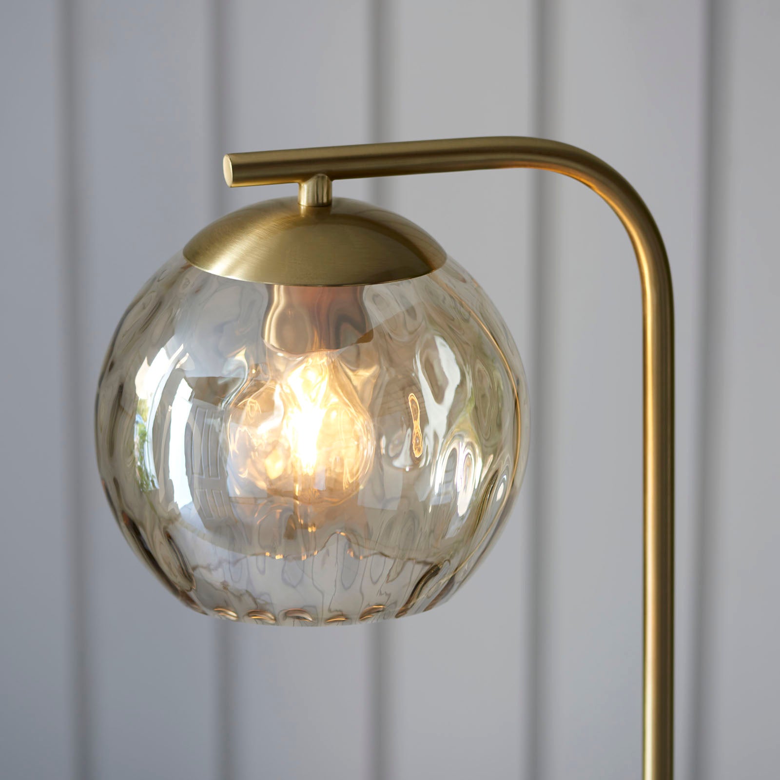 Dimple 1-Light Champagne Glass Floor Lamp with Brushed Brass Finish