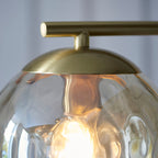 Dimple 1-Light Champagne Glass Floor Lamp with Brushed Brass Finish