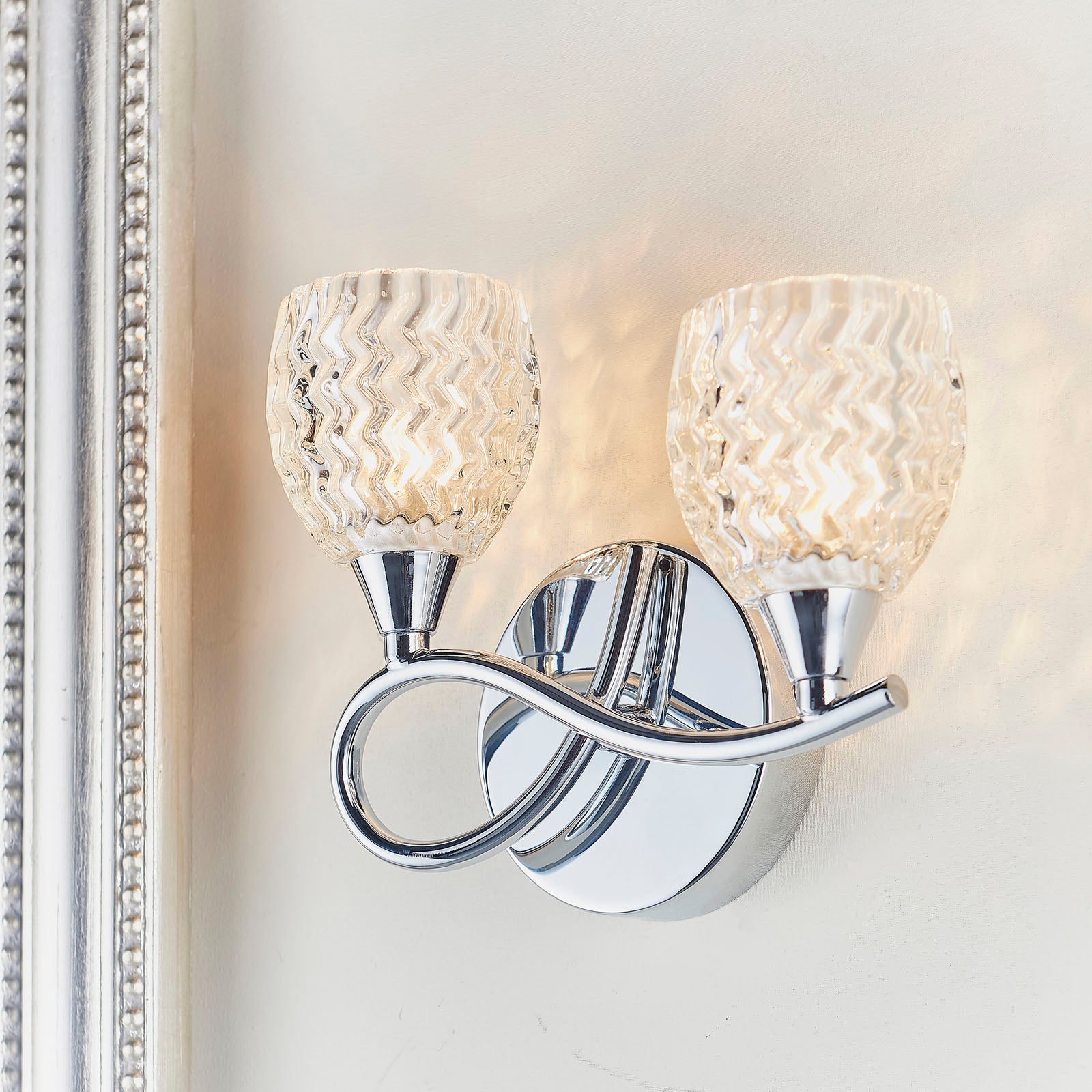 Boyer 2-Light Wall Sconce: Chrome & Curved Arms (Cut Glass Shades)