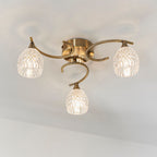 Boyer 3-Light Semi-Flush Mount: Antique Brass & Curved Arms (Cut Glass Shades)