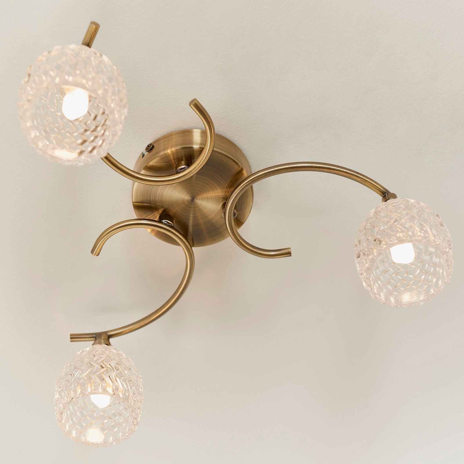 Boyer 3-Light Semi-Flush Mount: Antique Brass & Curved Arms (Cut Glass Shades)