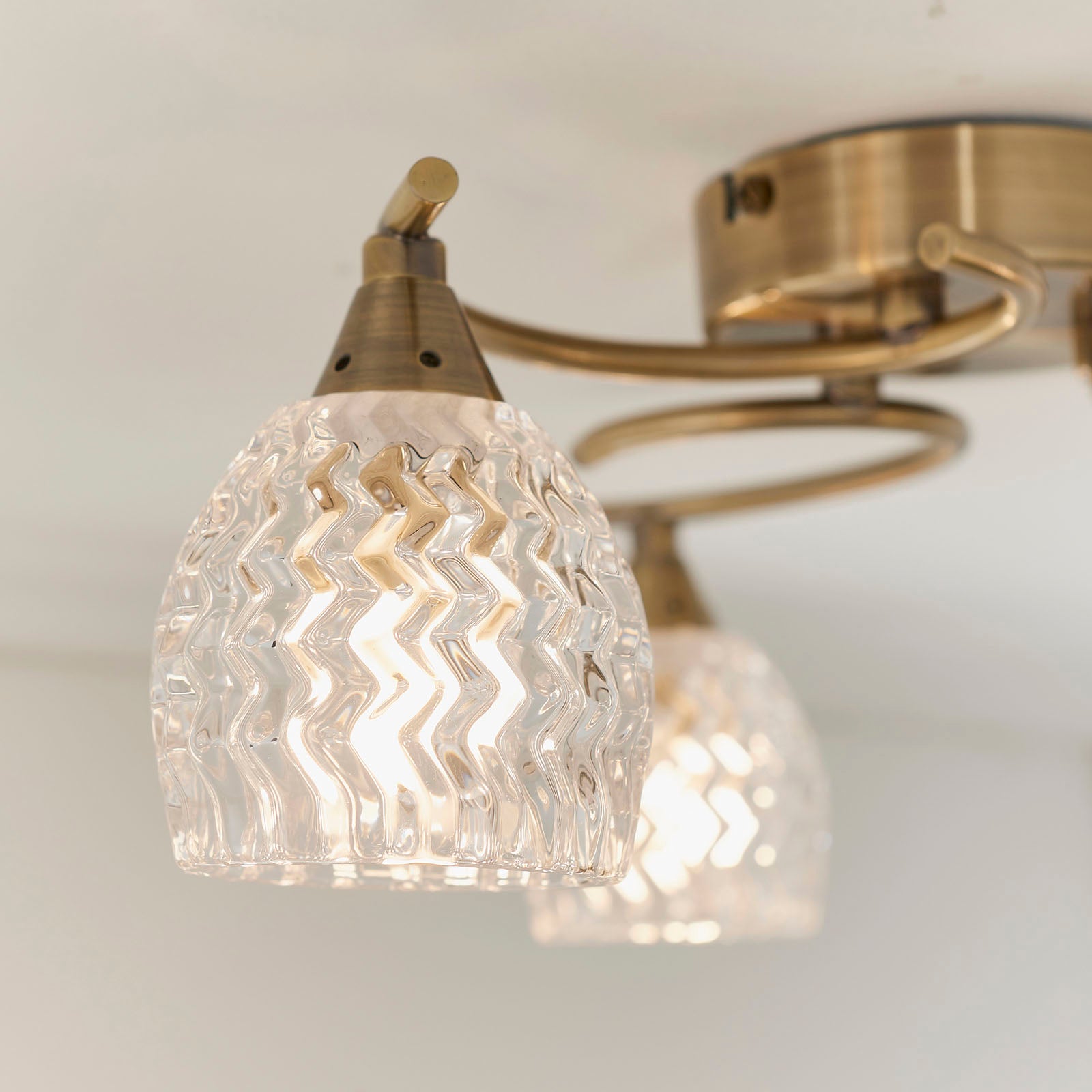Boyer 3-Light Semi-Flush Mount: Antique Brass & Curved Arms (Cut Glass Shades)