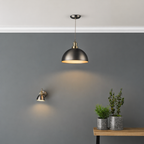 Antique chrome pendant light with brass detail in kitchen