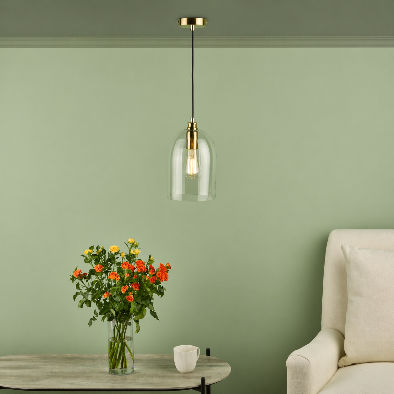 Glass pendant light with satin bronze fitting in interior