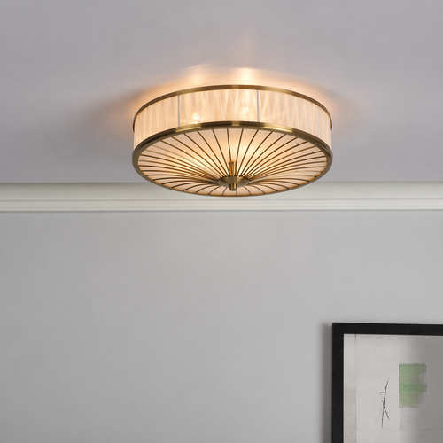 Antique brass flush ceiling light with white glass shade