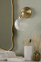Laura Ashley Langdon Bathroom Wall Light Matt Antique Brass and Textured Glass IP44