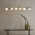 Gold 6 light bar pendant with opal glass shades