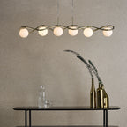 Gold 6 light bar pendant with opal glass shades