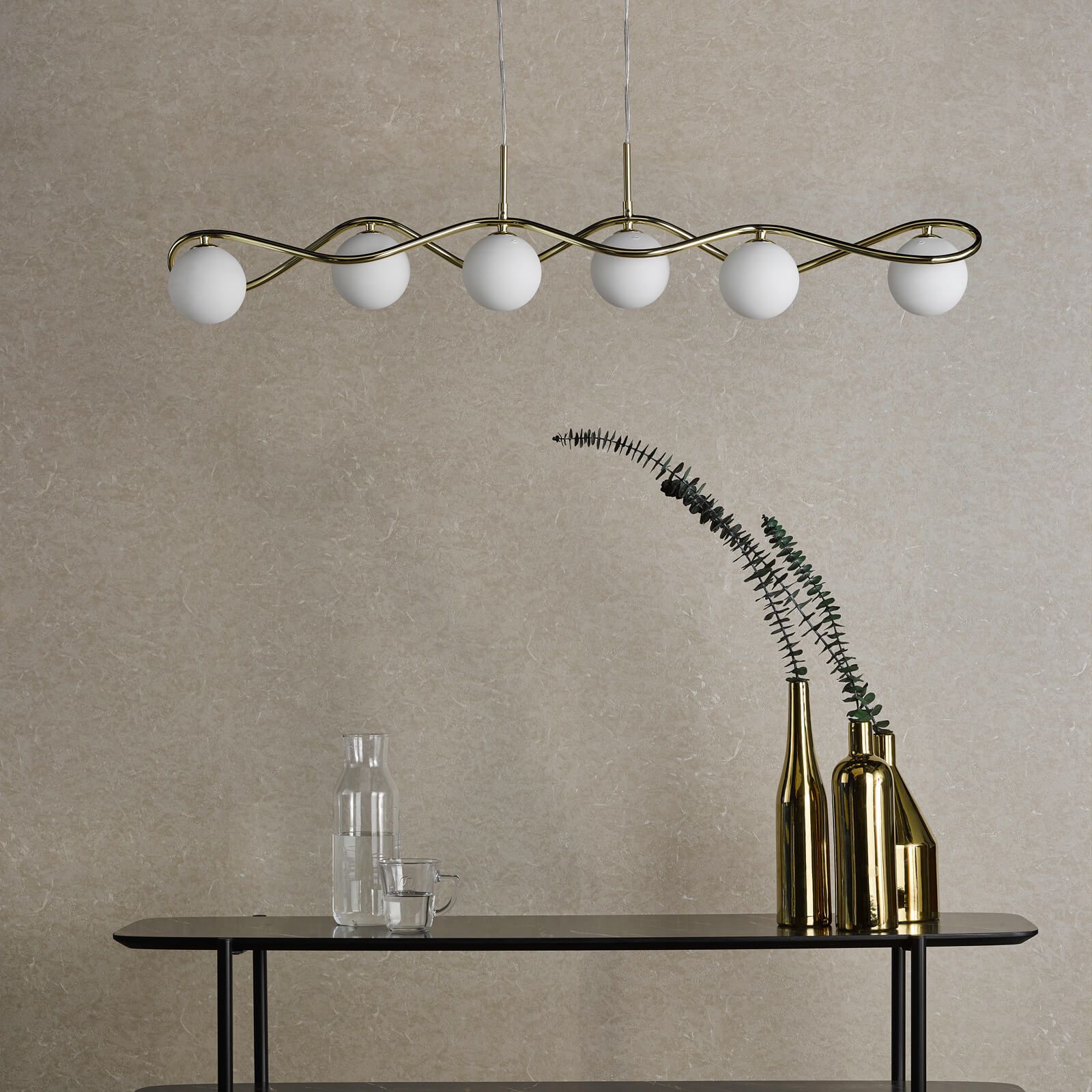 Modern bar pendant light above dining table setting