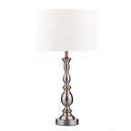 Satin chrome table lamp with fabric shade on white background