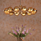 Ophira 12 Light Pendant Antique Gold and Amber Ribbed Glass