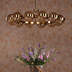 Ophira 12 Light Pendant Antique Gold and Amber Ribbed Glass