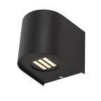 Matt black wall light with soft warm glow