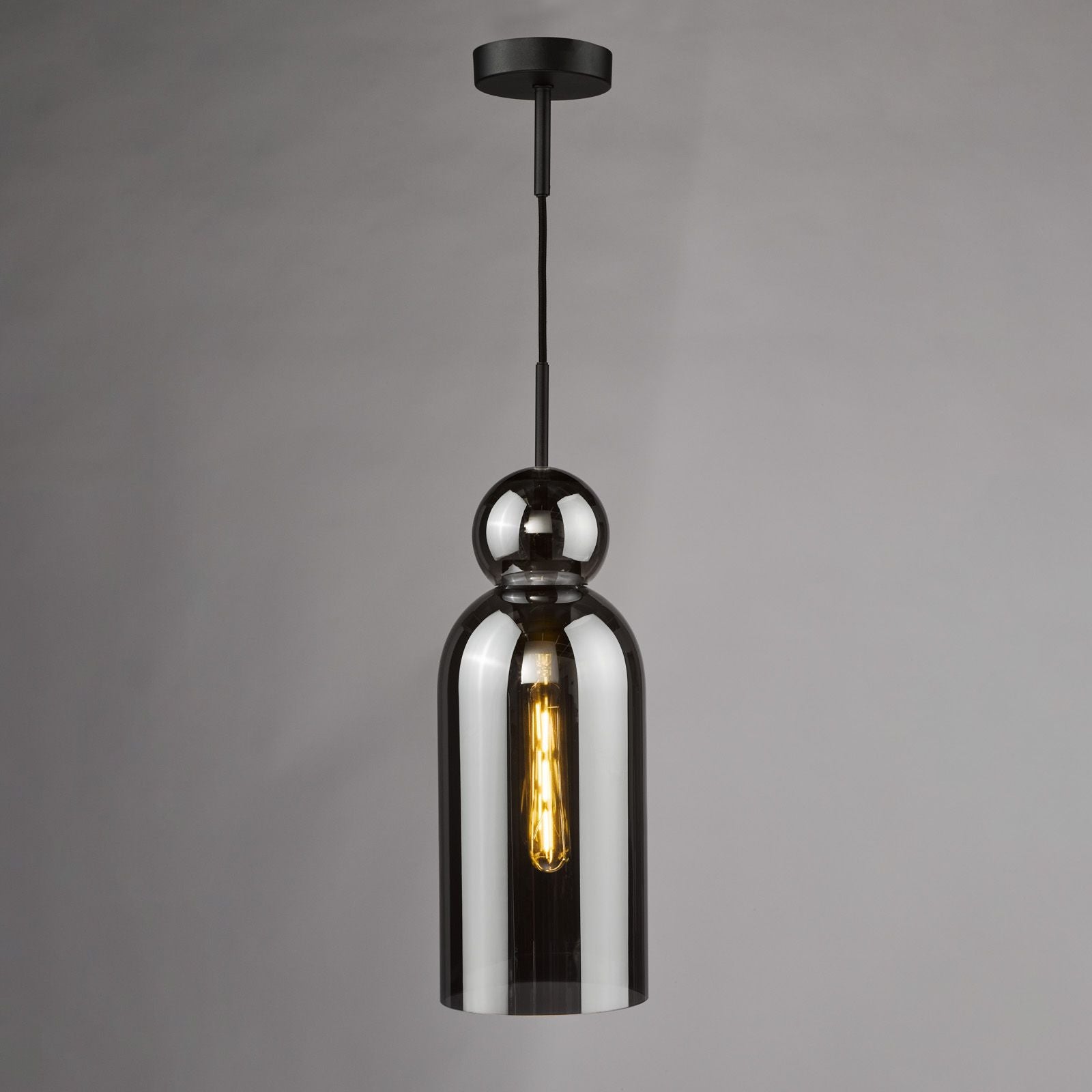 Contemporary pendant light with tinted glass detail