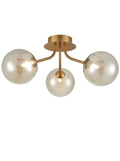 Cosmic 3 light fitting in antique gold with amber glass