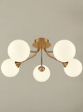 Cosmic 5 light fitting in antique gold with matt opal glass