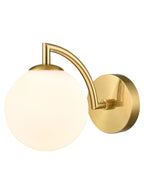 Aged brass wall light with opal glass globe