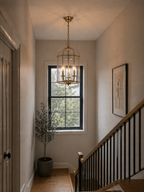 Hanging lantern light in entrance hallway setting